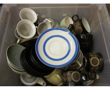 Box containing a quantity of various tea and coffee cups including Poole, Cornish kitchenware plates etc. 