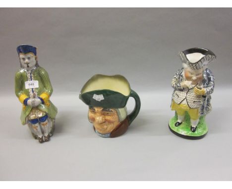 French Quimper pottery Toby jug together with an English pottery Toby jug and a Royal Doulton character jug, ' Toby Philpott 