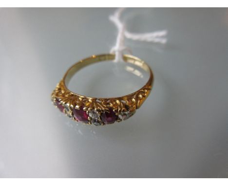 18ct Yellow gold half hoop ring set three rubies interspaced with six diamonds 