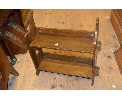 Small Liberty style oak two shelf bookrack with pierced sides 