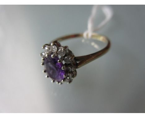 9ct Yellow gold amethyst and diamond set ring 