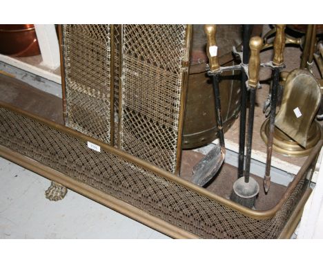 19th Century pierced brass fender and a brass fireguard, fire irons etc 