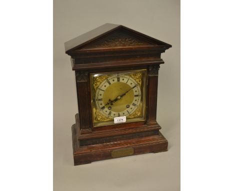 Edwardian mahogany bracket clock, the architectural case with flanking pilasters, the gilt brass dial with silvered chapter r