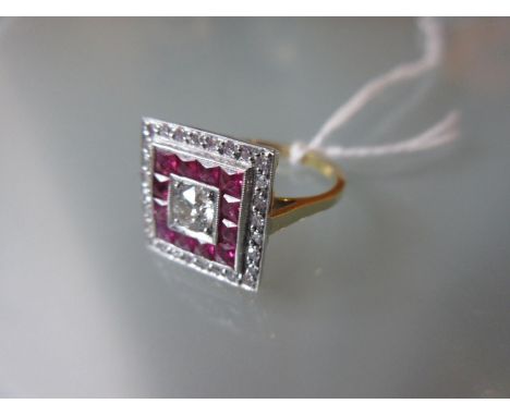 18ct Yellow gold ring of square design set central brilliant cut diamond, surrounded by a band of rubies and diamonds 