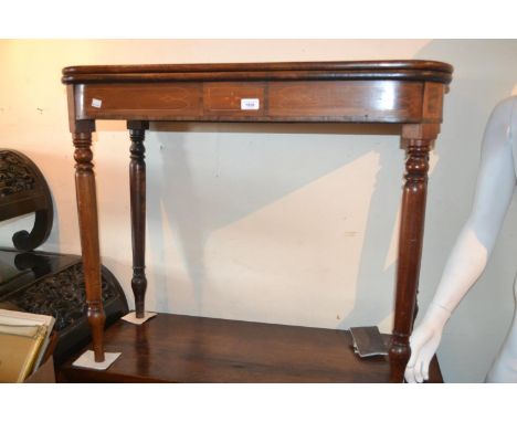 George III mahogany and line inlaid D shaped fold-over tea table on turned tapering supports 