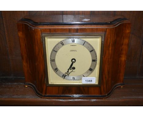 1950's Elliott single train walnut mantel clock together with four various dome top mantel clocks 