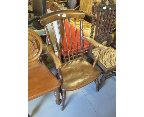 Antique beech and elm stick back kitchen elbow chair on turned supports with H-stretcher 