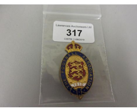 1910 Football Association gilt metal and enamel badge 