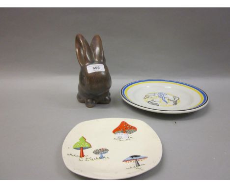 Denby stoneware figure of a rabbit, together with an Ashtead pottery plate decorated with a knight on horseback and a Midwint