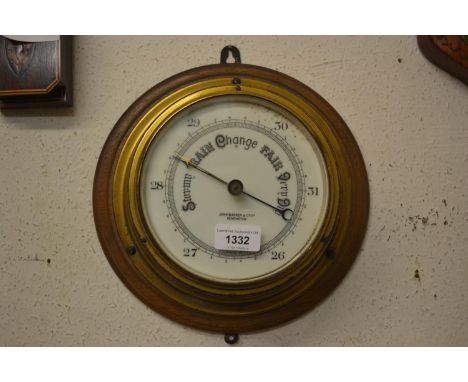 John Barker and Co., Kensington, circular gilt brass ship's bulkhead barometer 