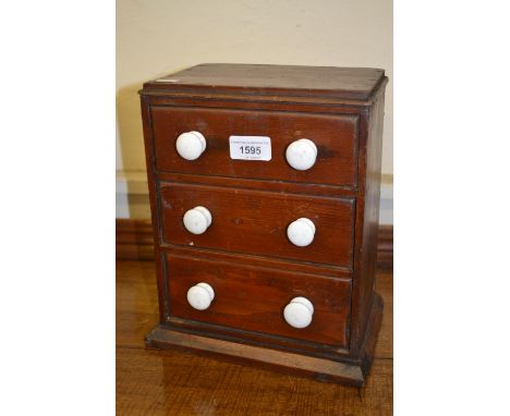 19th Century miniature three drawer table top chest with white ceramic handles 