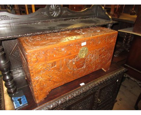 Small 20th Century Chinese trunk with hinged cover, 29ins wide, 15ins high 