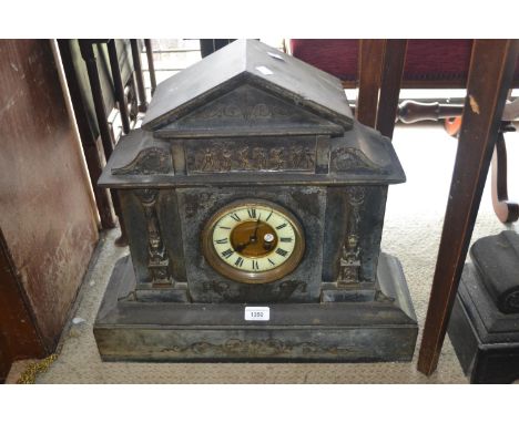 Large 19th Century black slate and gilt metal mounted mantel clock, the gilt and enamel dial with Roman numerals, the case de
