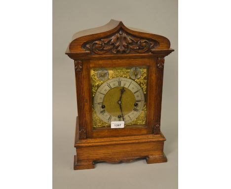 Late 19th Century oak cased bracket clock, the silvered and gilded dial with Roman numerals, subsidiary chime silent slow/fas