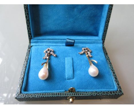 Pair of diamond and pearl bow design drop earrings 