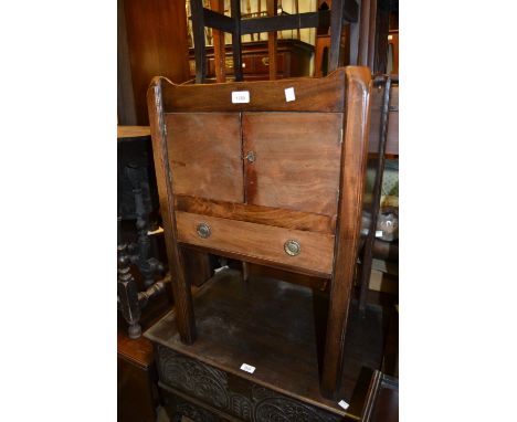 Early 19th Century mahogany tray top commode having two flush panel doors above a single drawer on square chamfered supports 