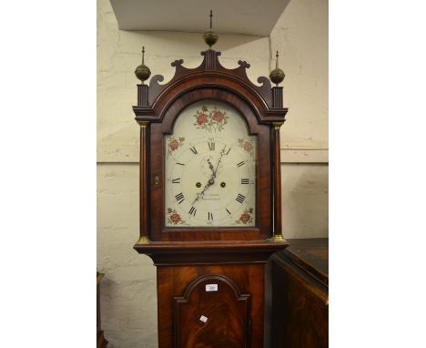 George III mahogany longcase clock, the arched hood with fluted columns above an arched door and plinth base, the rose painte