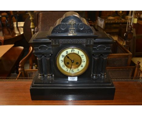 19th Century black slate metal mounted two train mantel clock 