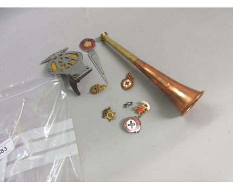 A.A. chrome and enamel motoring badge, small copper and brass post horn and a quantity of gilt and enamel badges including Bu