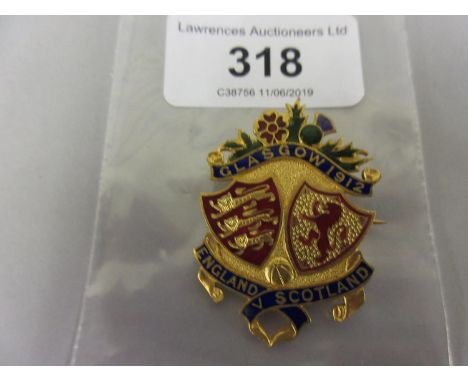 1912 Gilt metal and enamel badge, Glasgow, England V Scotland 