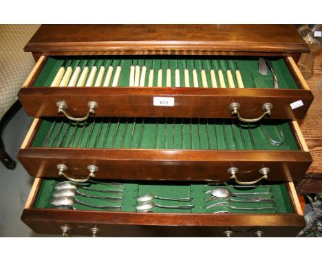 Mahogany canteen cabinet housing a twelve place setting harlequin canteen of mainly Georgian silver Fiddle pattern cutlery co