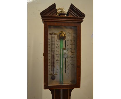 Mahogany and line inlaid stick barometer with silvered dial 