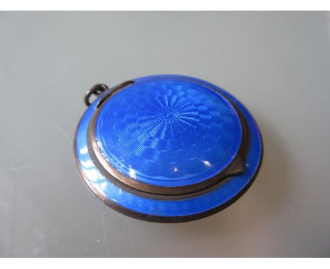 Circular silver and blue enamel decorated pendant compact 