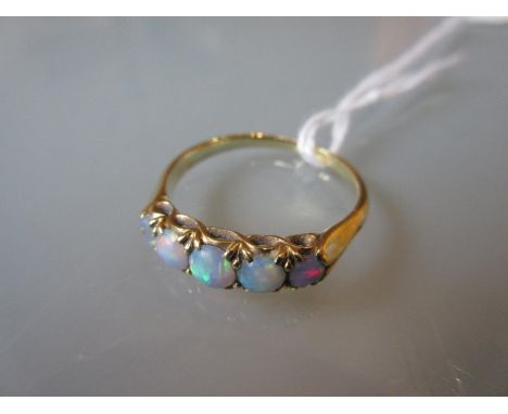 Yellow gold ring set five circular graduated opals 