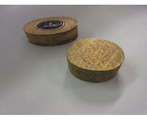 19th Century oval Continental gilt metal and enamel snuff box (at fault) together with another oval gilt metal snuff box 
