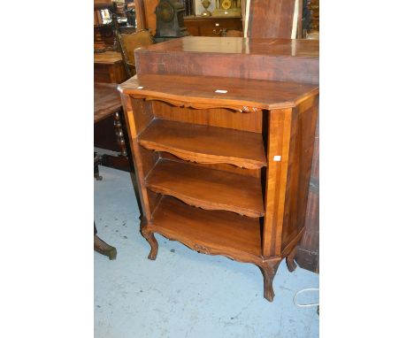 Small French crossbanded fruitwood three shelf open bookcase on cabriole front supports 