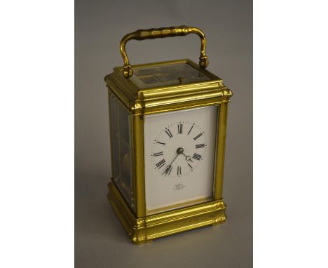 French gilt brass carriage clock examined by Dent, with an hour repeat function 