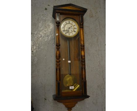 Late 19th or early 20th Century Continental beechwood and ebonised cased Vienna wall clock, the enamel dial with Roman numera