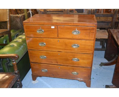 19th Century mahogany and boxwood strung straight front chest, the flush top above two short and three long drawers with oval