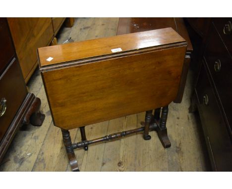 Late 19th / early 20th Century walnut Sutherland table on twin turned end supports united by a turned stretcher 