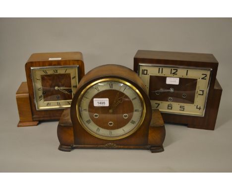 Art Deco walnut three train mantel clock, together with three other mantel clocks 