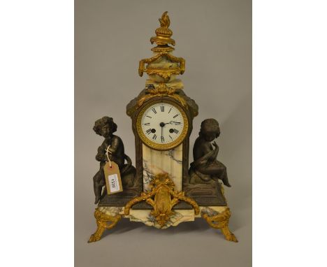 Late 19th / early 20th Century French mantel clock mounted with marble gilt metal and patinated spelter figures of children, 