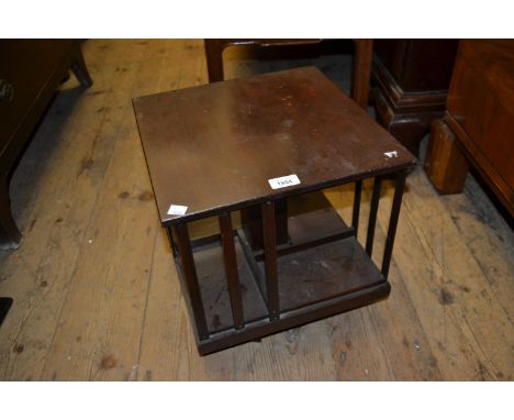 Edwardian mahogany table top revolving bookcase together with a similar oak revolving bookcase 