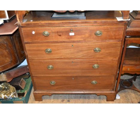 George III mahogany and boxwood line inlaid straight front chest of four graduated drawers with oval brass handles raised on 