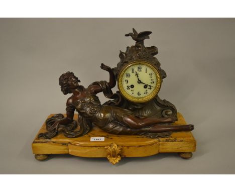 French brown patinated spelter figural two train mantel clock on a marble base 