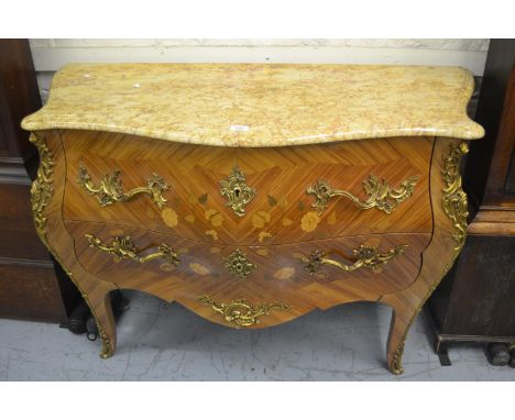 Early 20th Century French floral marquetry inlaid Kingwood and ormolu mounted commode with a Sienna marble top above two long