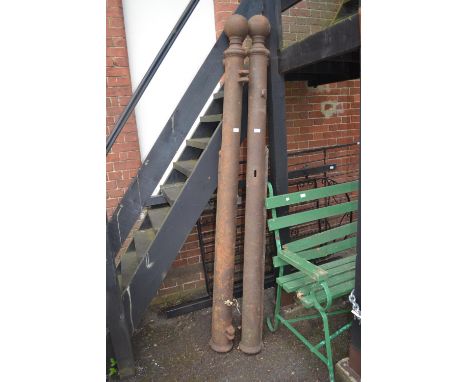 Pair of antique cast iron gate posts with ball finial, 90ins high each, another cast iron central gate post, 6ft high, togeth
