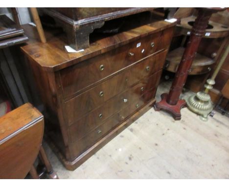 19th Century Continental walnut commode having four drawers with brass circular ring handles on a plinth base, 38.5ins high x