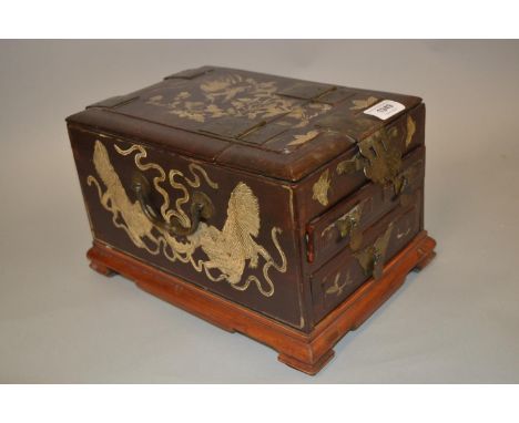 19th Century Chinese lacquer table cabinet with painted stylised decoration, the hinged lid enclosing a folding mirror above 