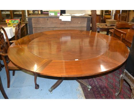 19th Century Jupe type rosewood and mahogany extending dining table, the circular tilt top extending with six slotting leaves