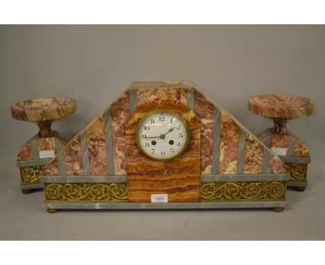 Large Art Deco pink flecked and grey marble three piece clock garniture with gilt metal mounts, the circular enamel dial with