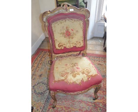 19th Century French gilded side chair with tapestry covered back and seat raised on cabriole front supports 