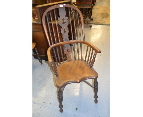 19th Century ash and elm Windsor chair with a pierced splat and stick back, panel seat, turned supports and crinoline stretch