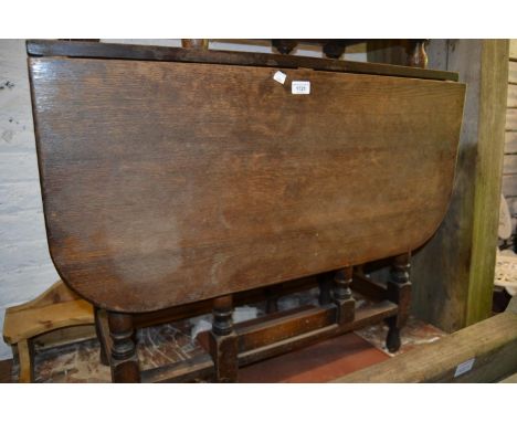 1930's Rectangular oak gate leg dining table on turned supports 