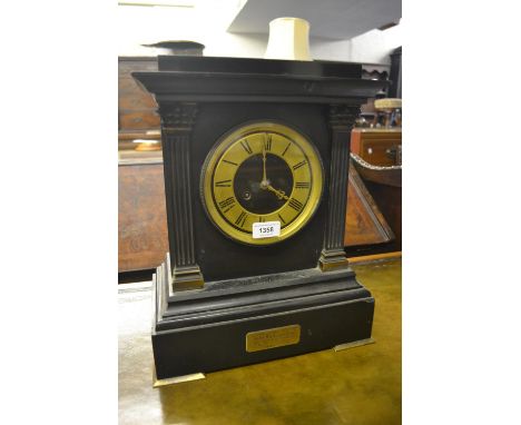 19th Century black slate and gilt metal mounted mantel clock, the rectangular case with flanking pilasters, the unusual two t