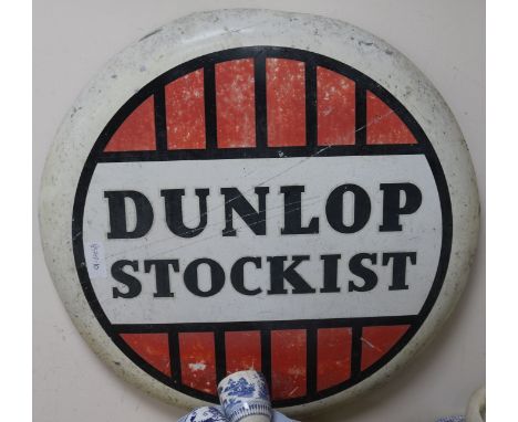 A Dunlop Stockist aluminium sign